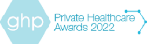 Logo for "ghp Private Healthcare Awards 2022". The design includes a pale blue hexagon on the left with "ghp" in white lowercase letters. To the right, next to a minimalist molecular structure, the text "Private Healthcare Awards 2022" is written in blue, celebrating excellence in fields like life balance chiropractic.